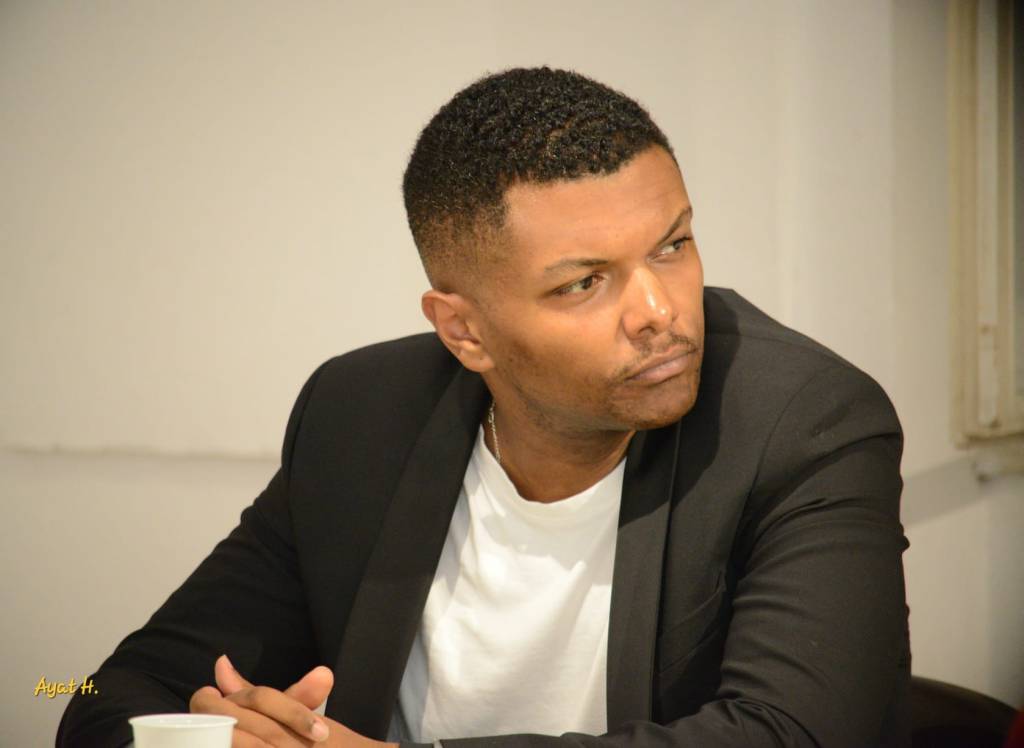 A picture of a man, listening intently