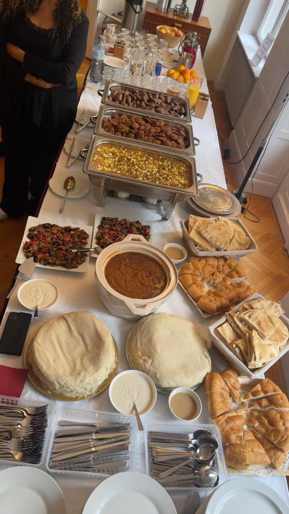 A Buffet of Sudanese Food with various dishes and finger-foods.